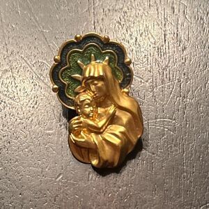 Vintage Avon Madonna and child gold tone with blue and green enamel [stamped]